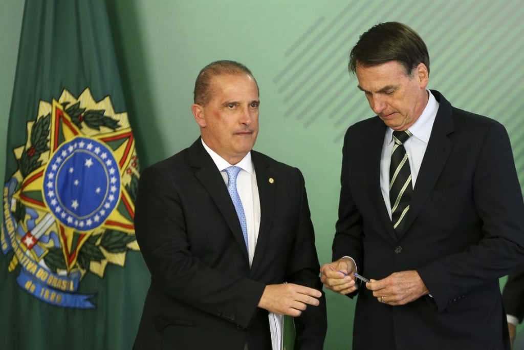 Jair Bolsonaro e Onyx Lorenzoni, durante cerimônia de sanção de lei que fez minireforma eleitoral [fotografo]Marcelo Camargo/ABr[/fotografo]