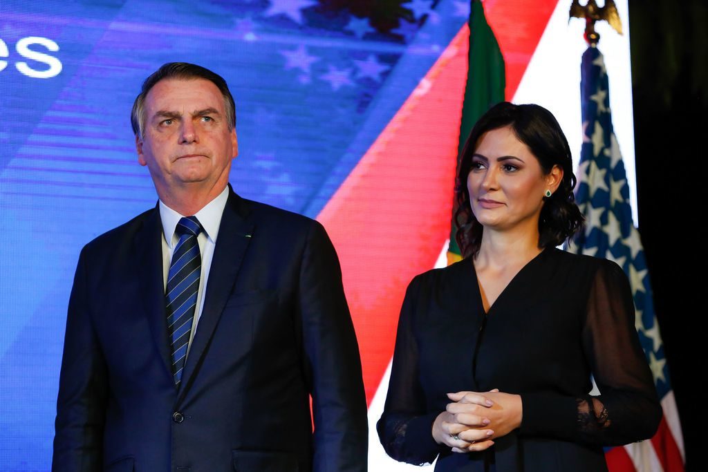 O presidente da República, Jair Bolsonaro, acompanhado da primeira-dama, Michelle Bolsonaro, durante coquetel coquetel em comemoração aos 243 anos da independência dos Estados Unidos da América (EUA).